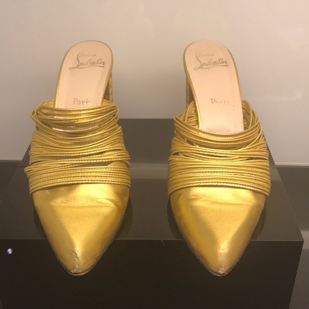 Christian Louboutin Gold Mules. Red bottoms.